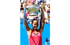 EASTBOURNE, ENGLAND - JUNE 21:  Madison Keys of the USA celebrates with the trophy after defeating Angelique Kerber of Germany in the Women's Final at the Aegon International at Devonshire Park on June 21, 2014 in Eastbourne, England.  (Photo by Ben Hoskins/Getty Images)